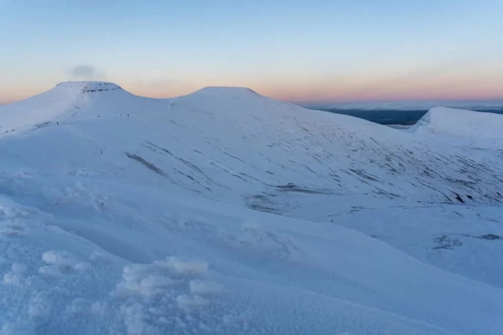 Snow covered Pen y Fan at sunset