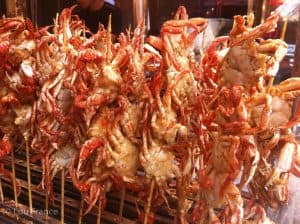 Crab on a stick is a strange street food in China 