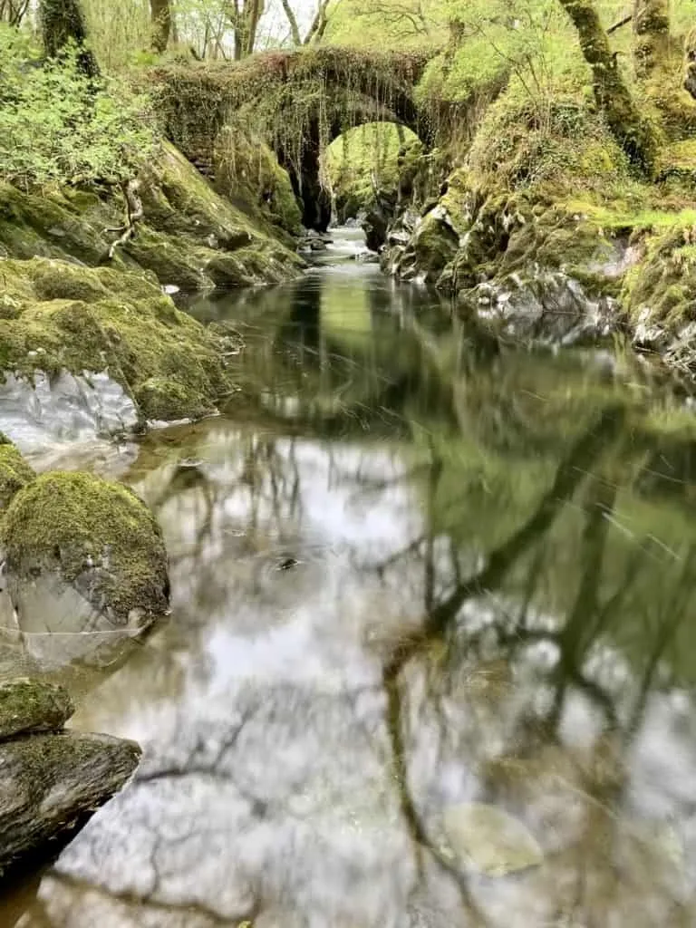 Penmachno Bridge is a beautiful old packhorse bridge in Snowdonia and a top photographic location for a trip to North Wales